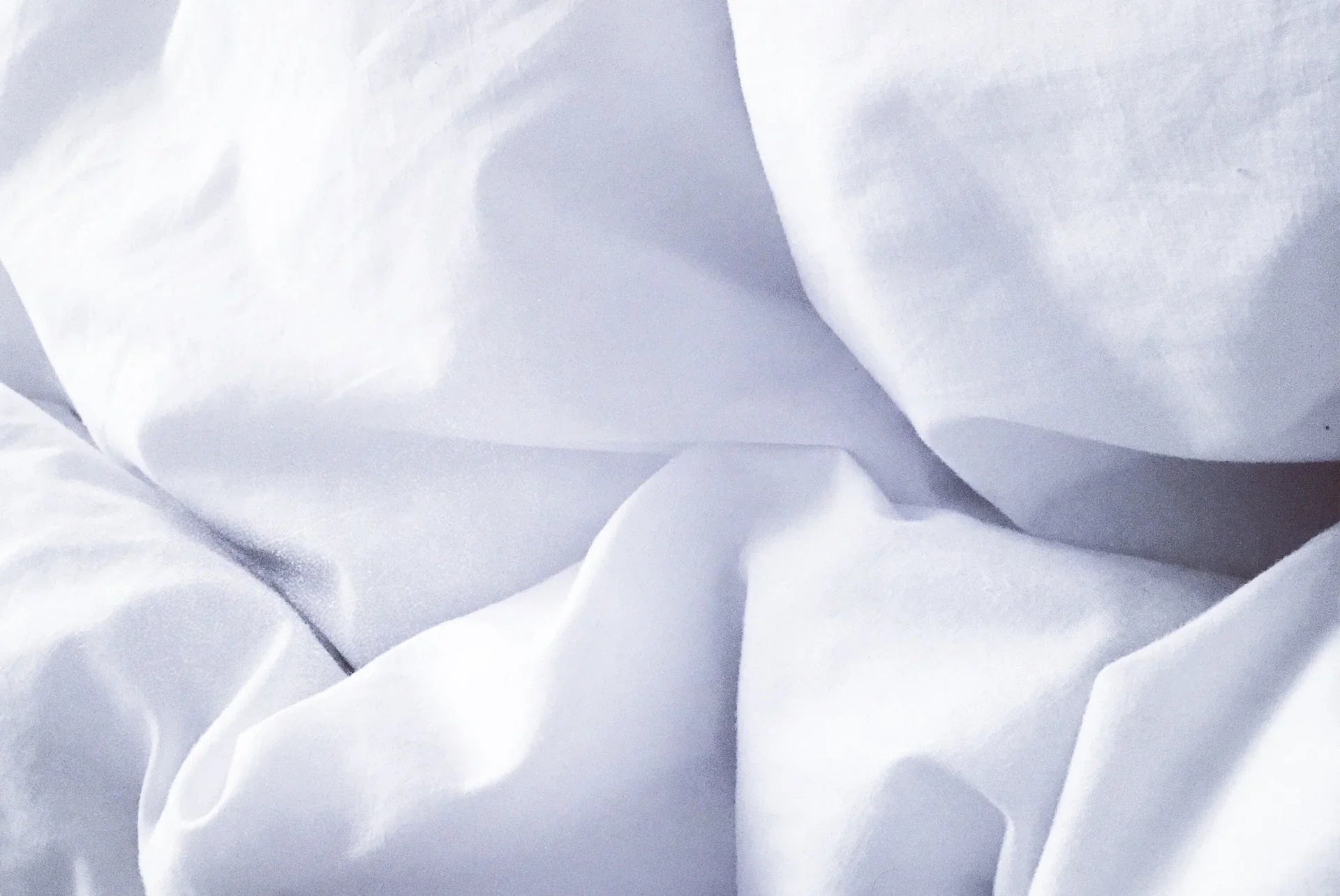 Linge hôtelier blanc premium écoresponsable, draps doux et certifiés Oeko-Tex pour hôtels et maisons d'hôtes